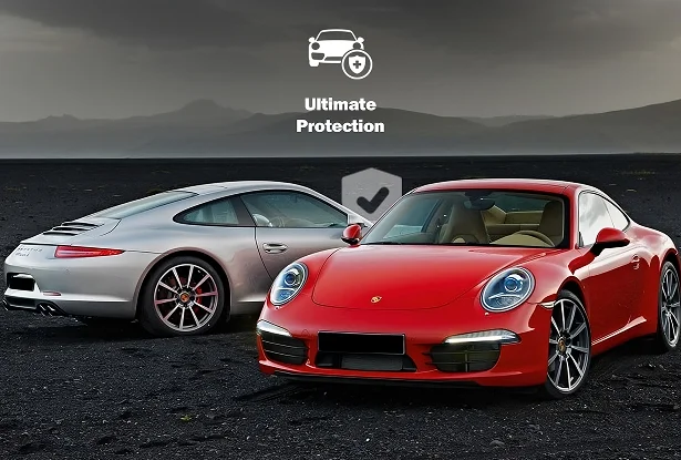 Two Porsche sports cars parked on rugged terrain, symbolizing durable paint protection in real-world conditions.
